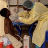 A laboratory nurse takes a sample from a child declared a suspected case mpox at a treatment centre in Munigi, North Kivu province, Democratic Republic of the Congo. (Photo: Reuters)