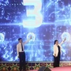 Representatives from Cao Bang province and Baise city jointly inaugurate the cross-border tourism route between the two localities. (Photo: VNA)
