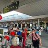 Passengers at Tan Son Nhat International Airport (Photo: VNA)