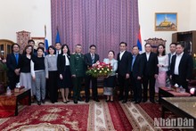 Vietnamese Embassy in Russia congratulates Lao Embassy on the occasion of traditional New Year Festival Bunpimay. (Photo: NDO)