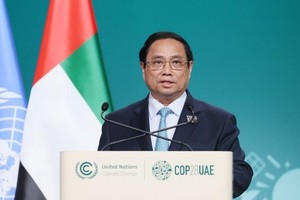 Prime Minister Pham Minh Chinh addresses the World Climate Action Summit. (Photo: VNA)