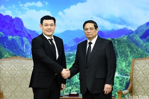 Prime Minister Pham Minh Chinh (R) receives Jakkapong Sangmanee, Minister Attached to the Thai Prime Minister's Office and the Thai PM’s Special Envoy. (Photo: NDO)
