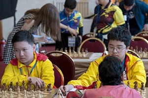 Player Nguyen Nam Kiet (left) delivers an impressive performance at the championship.