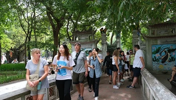 Foreign tourists visit Ngoc Son Temple, Hanoi. (Photo by HO HA)