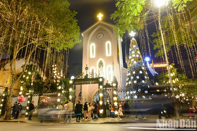 A church in Hanoi is embellished with light decorations.