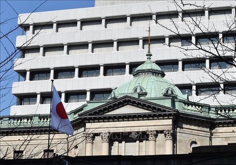 The Bank of Japan has lowered its economic growth outlook. (Photo: AFP/VNA)