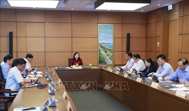 Legislators discussed in group the implementation of the socioeconomic development plan and State budget in the first months of 2023. (Photo: VNA)