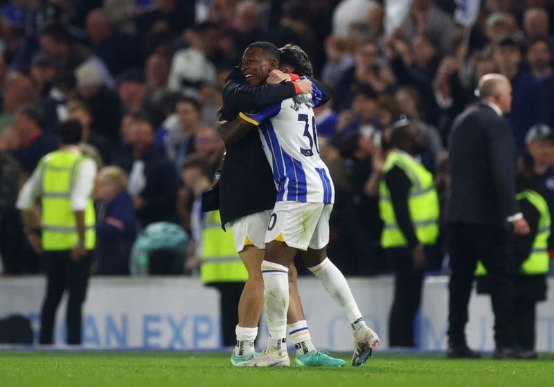 Brighton & Hove Albion's Pervis Estupinan with Julio Enciso celebrate qualifying for the Europa League - Premier League - Brighton & Hove Albion v Manchester City - The American Express Community Stadium, Brighton, the UK - May 24, 2023. (Photo: Action Images via Reuters)