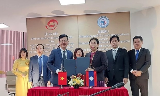 Vietnam's State Archives and Records Department signs MoU on archival cooperation with Laos' National Archives Department (Photo: VNA) 