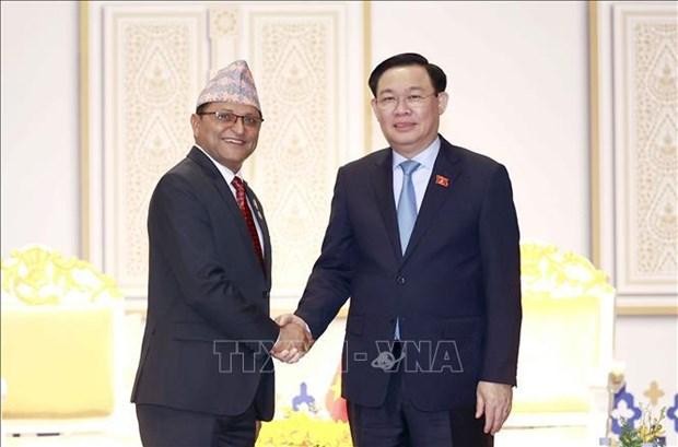 National Assembly Chairman Vuong Dinh Hue (R) and his Nepalese counterpart Ganesh Prasad Timilsina. (Photo: VNA)