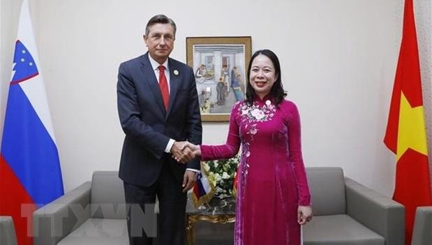Vice President Vo Thi Anh Xuan (R) and Slovenian President Borut Pahor (Photo: VNA) 