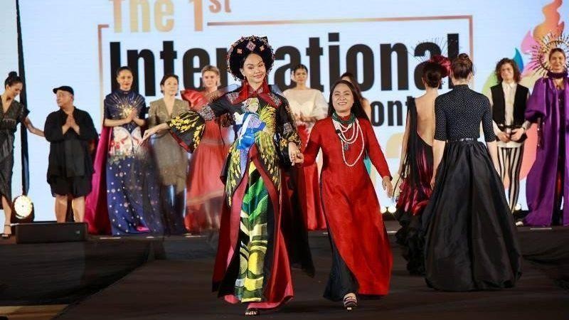 Designer Lan Huong and models show off the “Prosperous Planet” collection.