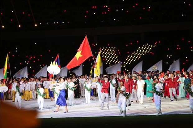The Vietnamese sports delegation at the opening ceremony of the 32nd Southeast Asian Games (Photo: VNA)