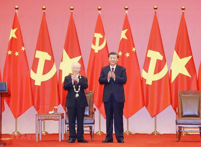 General Secretary of the CPV Central Committee Nguyen Phu Trong (L) and General Secretary of the CPC Central Committee and President of China Xi Jinping. (Photo: VNA)