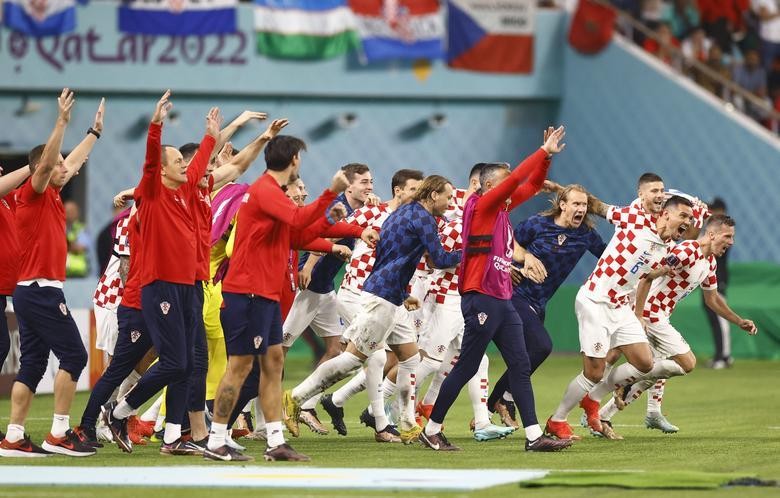 Croatia players celebrate after the match as they finish in third place. (Photo: REUTERS)