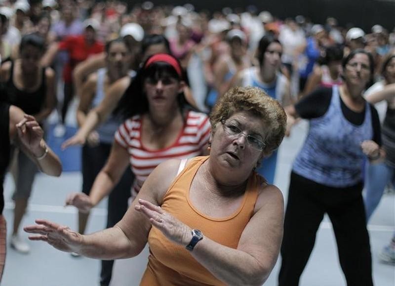 People take part in an aerobics class in Cartago, east of San Jose on July 10, 2012. (Photo: REUTERS)
