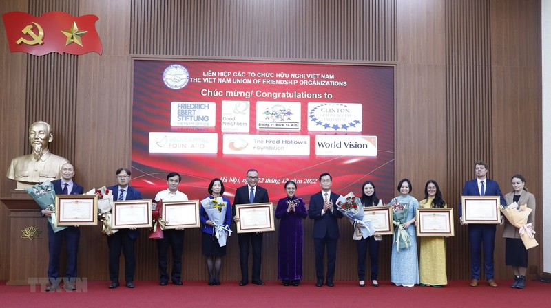 Prime Minister’s certificate of merit granted to seven foreign non-governmental organisations (NGOs) on December 22 (Photo: VNA)