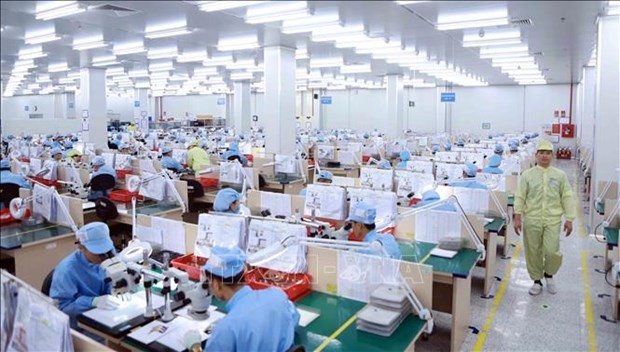 Production at Korean-invested YPE Vina Company at Binh Xuyen 2 IP in Vinh Phuc province. (Photo: VNA)