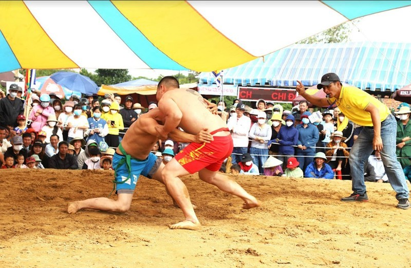 Wrestlers compete in a match