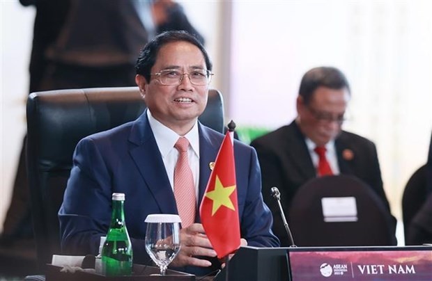 Prime Minister Pham Minh Chinh attends the dialogue session between ASEAN leaders and representatives of the High-Level Task Force ></em></div>
<div style=