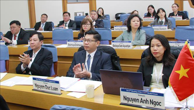 The Vietnamese delegation attend the forum. (Photo: VNA)