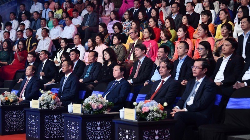Deputy PM Tran Hong Ha and other delegates attend the programme. (Photo: NDO)