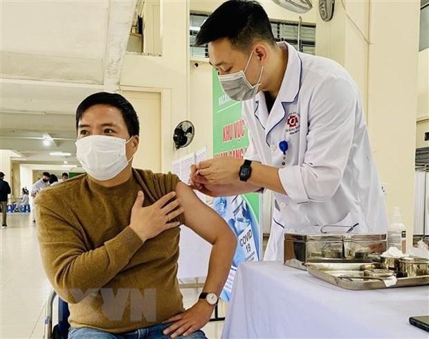 A man gets vaccinated against COVID-19. (Photo: VNA) 