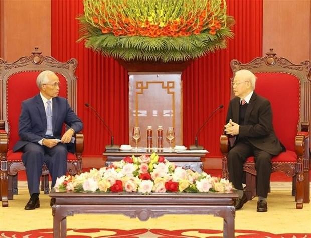 Party General Secretary Nguyen Phu Trong (R) and head of the LPRP’s Commission for Propaganda and Training Khamphan Pheuyavong (Photo: VNA)