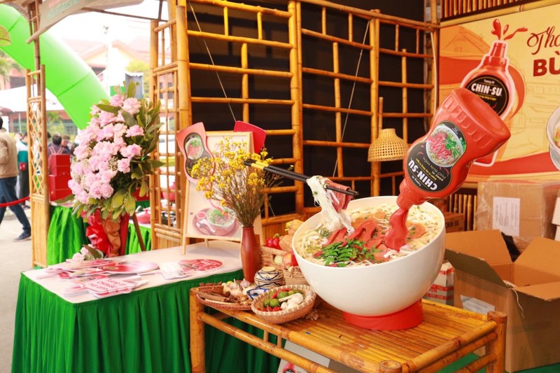 A booth showcasing CHIN-SU chili sauce.