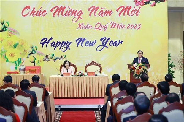 Prime Minister Pham Minh Chinh speaks at the New Year meeting with the banking sector. (Photo: VNA)