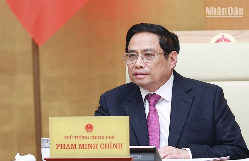Prime Minister Pham Minh Chinh speaks at the meeting. (Photo: Tran Hai)