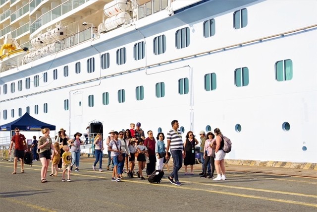 Foreign tourists from the cruise ship Spectrum of the Seas disembark to go sightseeing in the southern province of Ba Ria - Vung Tau as the ship docked at the Tan Cang-Cai Mep on February 26-27, 2023. (Photo: VNA)