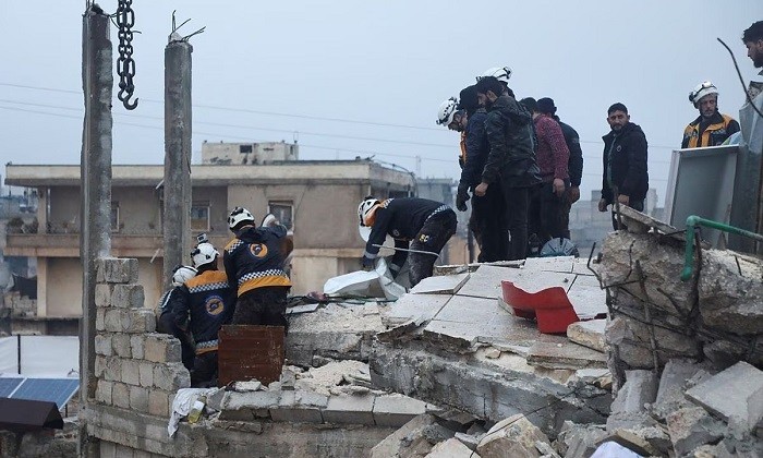 Rescuers search for survivors under the rubble of a damaged building, following an earthquake, in rebel-held Azaz, Syria, February 6, 2023. (Photo: Reuters)