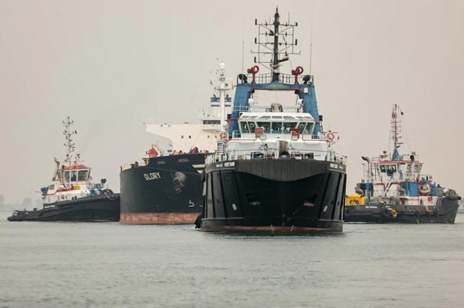 Less than two weeks ago, tugboats moved a bulk carrier stranded for several hours in the Suez Canal. (File/AFP)