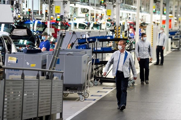 Euro zone business activity was shored up last month by the bloc's dominant services industry offsetting a deepening decline in the manufacturing sector.