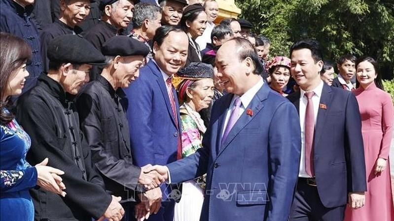 President Nguyen Xuan Phuc meets outstanding individuals from Ha Giang province. (Photo: VNA)
