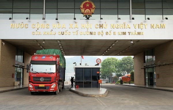 The Chinese side has announced that it will completely resume the operation of border gates and paths with Vietnam in northern Lao Cai province from January 8 (Photo: VNA)