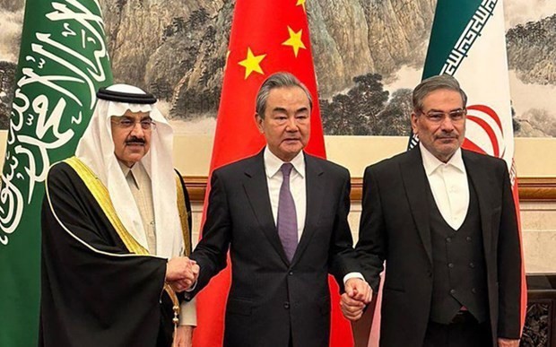 Saudi Arabian Minister of State and national security adviser Musaad bin Mohammed Al Aiban, Director of the Office of the Central Foreign Affairs Commission of the Chinese Communist Party Wang Yi and Iran's Supreme National Security Council secretary Ali Shamkhani. (Photo: Reuters/Vietnam+)