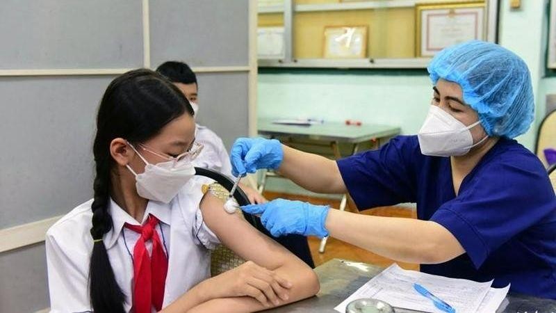 The total number of doses of COVID-19 vaccines injected reached 255,797,365. (Photo: tuoitre.vn)