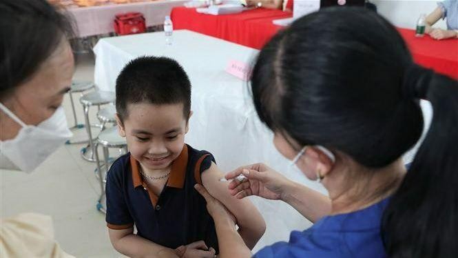 The total number of doses COVID-19 vaccines injected reached 259,463,342. (Photo: VNA)