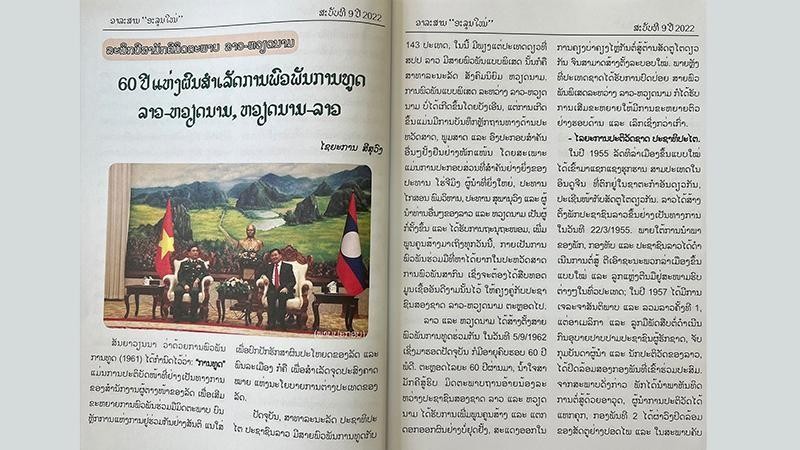 The article of the Anou Mai magazine highlighting Vietnam - Laos special ties. (Photo: NDO)