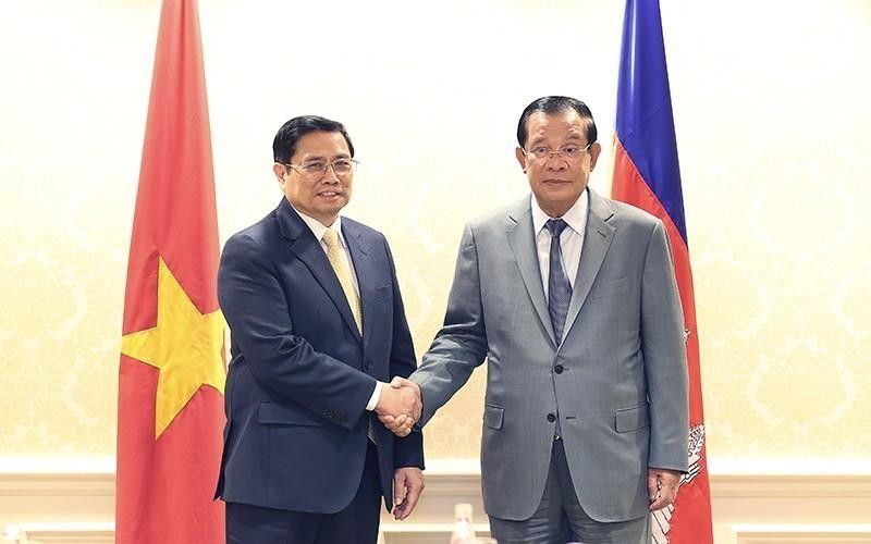 Prime Minister Pham Minh Chinh and Cambodian Prime Minister Hun Sen on the occasion of the ASEAN-US Special Summit in the US in May 2022. (Photo: VNA)