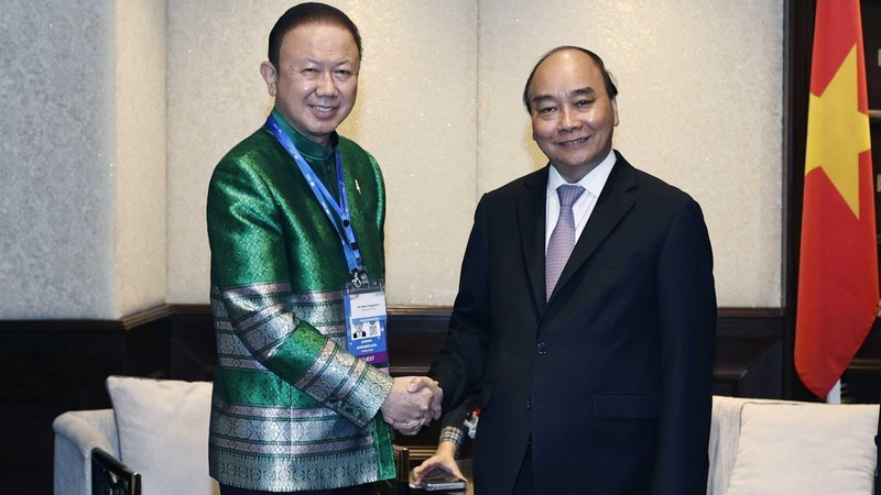 President Nguyen Xuan Phuc (R) and President of the Thailand-Vietnam Friendship Association (TVFA) Sanan Angubolkul. (Photo: VNA)