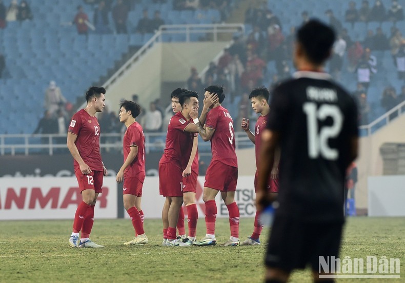 Vietnamese players rejoice after the referee blew the whistle to end the semi-final second leg.