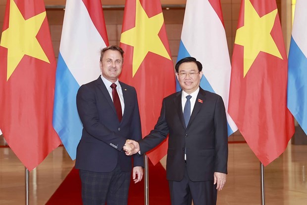 National Assembly Chairman Vuong Dinh Hue (R) and Prime Minister of Luxembourg Xavier Bettel (Photo: VNA)