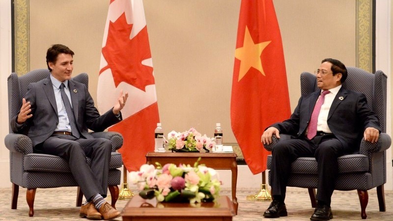 Prime Minister Pham Minh Chinh (R) and his Canadian counterpart Justin Trudeau at the meeting (Photo: Thanh Giang)