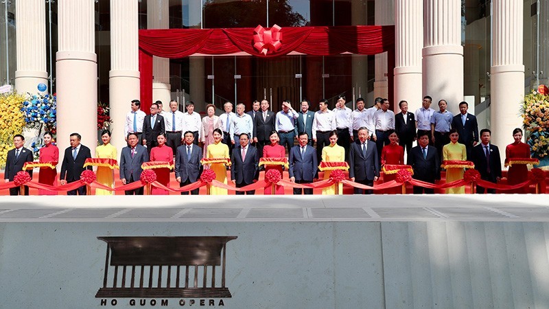 PM Pham Minh Chinh (front, centre) and officials cut the ribbon to open the Ho Guom Opera in Hanoi on July 9. (Photo: Nam Nguyen)