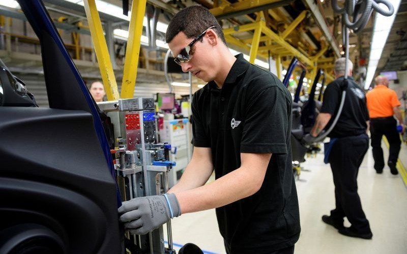 Workers at a car factory in England. (Photo: Reuters)