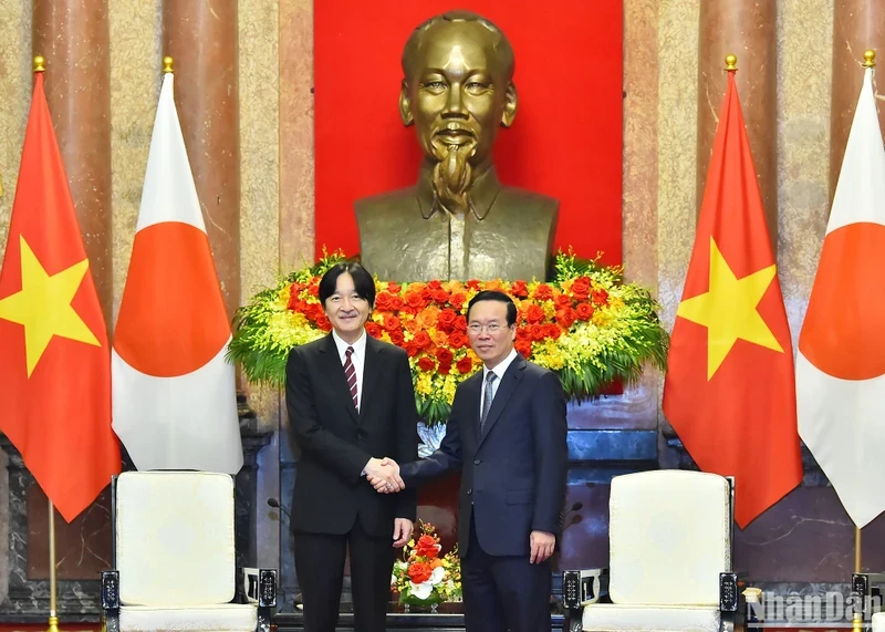 President Vo Van Thuong (R) and Japanese Crown Prince Akishino at the reception.