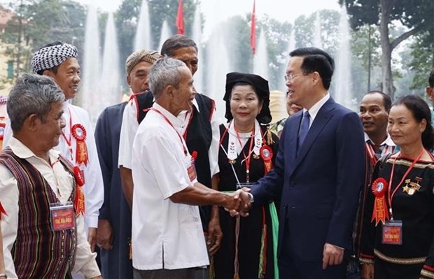 President Vo Van Thuong meets with reputable citizens from ethnic minority groups across the country on December 12. (Photo: VNA)